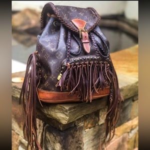 Authentic Louis Vuitton back pack purse.